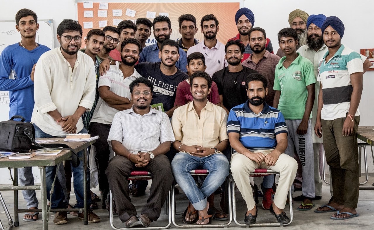 From the Field: Group picture from a Farmers' Training in Rural Punjab (India) during one of the ethnographic studies on social enterprises empowering rural farmers to become micro-entrepreneurs in solar applications